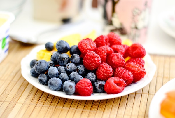 a photo of berries on a plate